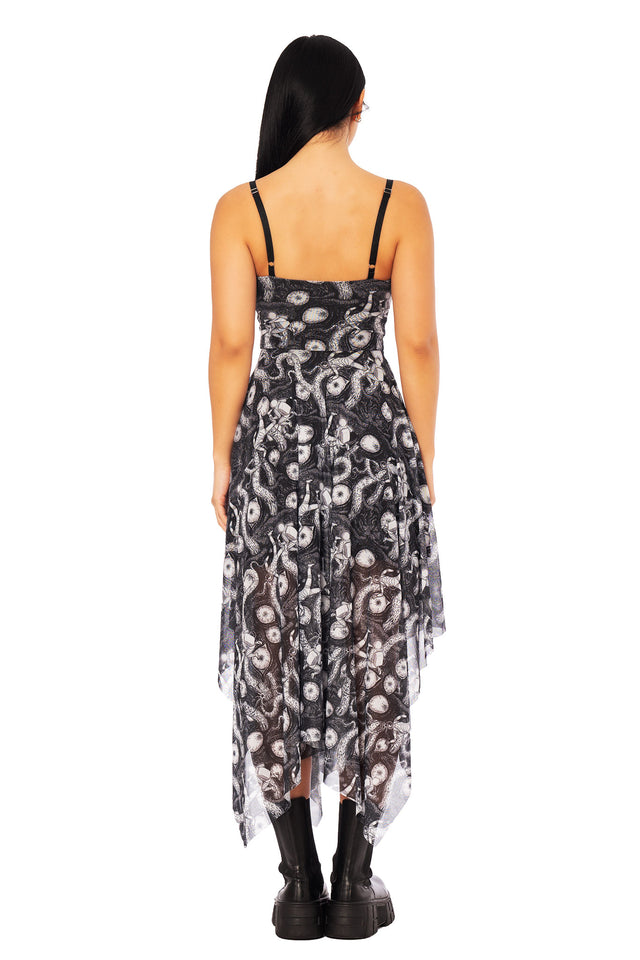 Remina handkerchief hem dress from the Junji Ito x BlackMilk collection, black and white asymmetric midi dress with celestial horror print.