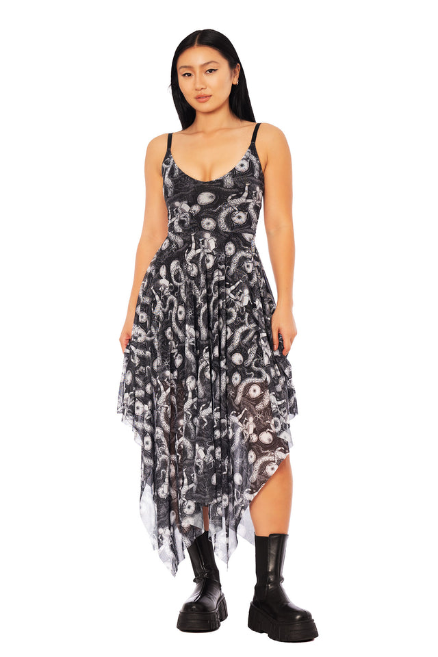 Junji Ito x BlackMilk Remina handkerchief dress, black and white asymmetric midi dress with flowing layered hem and cosmic manga artwork.
