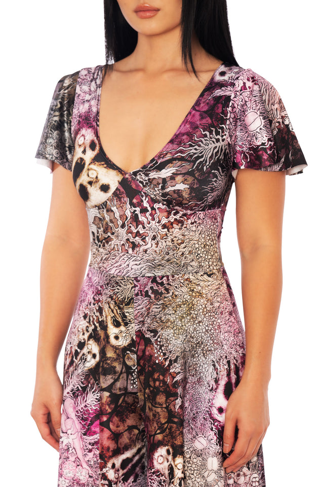 Dark romantic statement jumpsuit inspired by Junji Ito No Longer Human, wide leg gothic silhouette with detailed horror manga floral artwork.