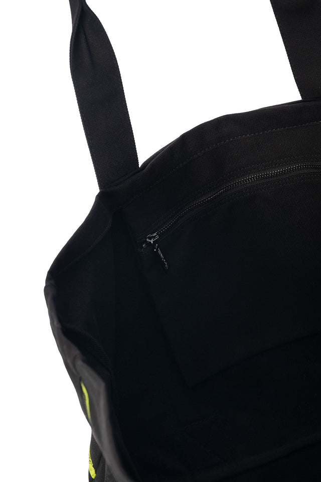 Junji Ito Gyo anime tote bag for women featuring neon green walking shark print on sturdy black canvas, Japanese horror manga streetwear accessory.