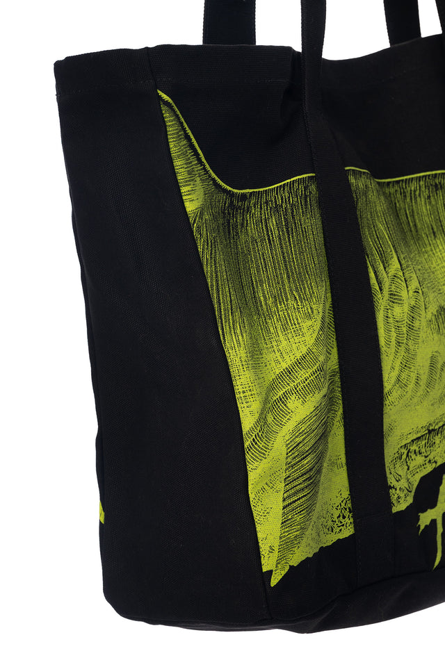 Gyo shark canvas tote bag from the Junji Ito x BlackMilk collaboration, thick black day bag with neon mechanical shark illustration in alternative gothic anime fashion style.
