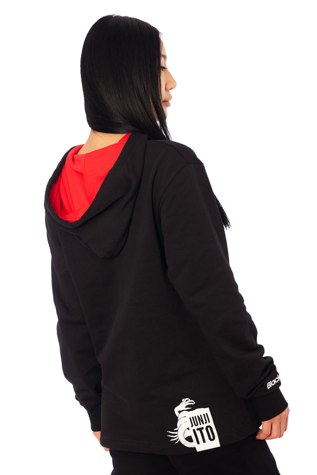 Junji Ito Uzumaki graphic hoodie in black cotton, relaxed fit unisex sweatshirt featuring a striking red spiral centre and detailed manga artwork inspired by Japanese horror.