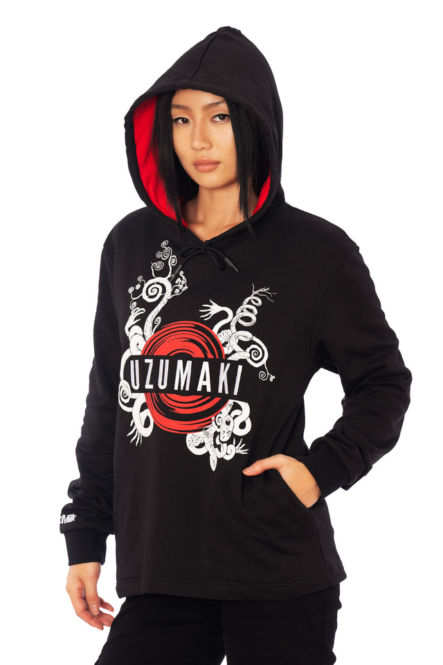 Uzumaki spiral print hoodie from the Junji Ito x BlackMilk collaboration, black unisex cotton pullover sweatshirt with central red logo design and gothic anime streetwear aesthetic.