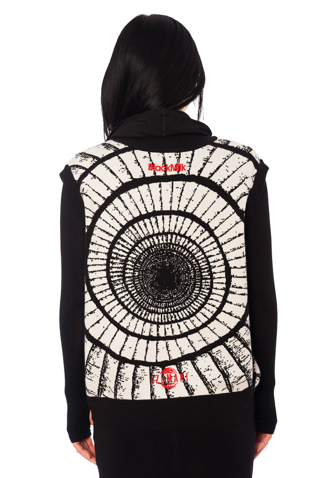 Oversized knit vest inspired by Junji Ito Uzumaki, bold black and ivory spiral design with red embroidered accent.