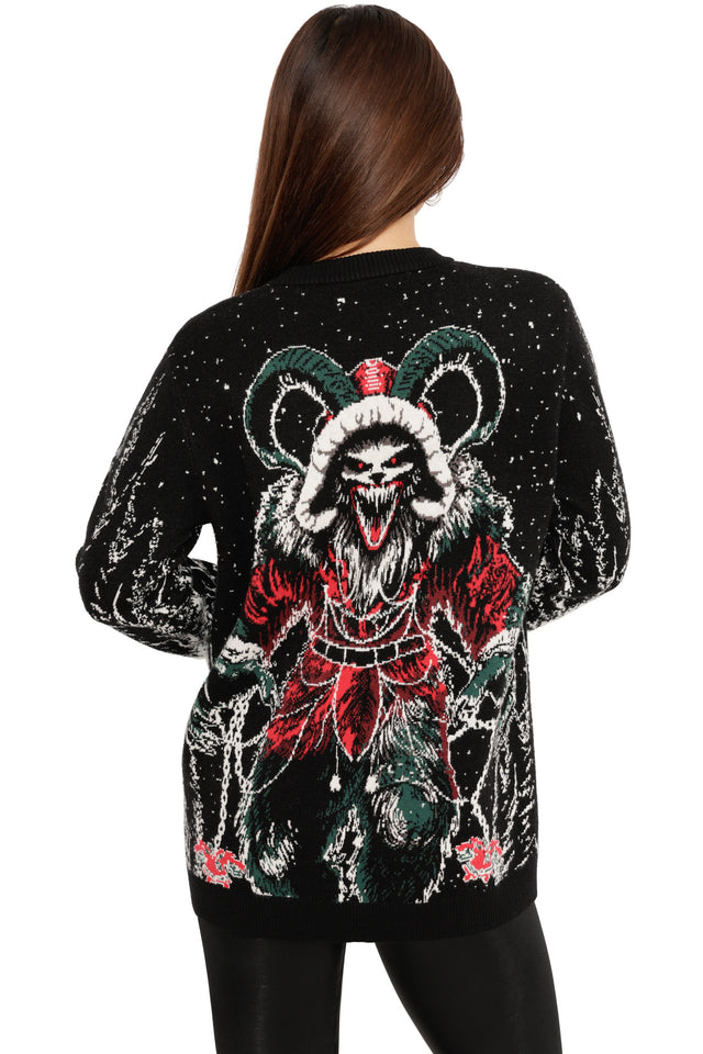 gothic christmas knit jumper with krampus monster print