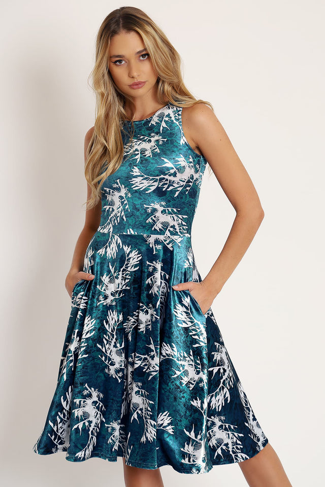Leafy Sea Dragon Velvet Princess Midi Dress by BlackMilk Clothing featuring teal velvet fabric with white leafy sea dragon print, sleeveless fitted bodice and flared midi skirt