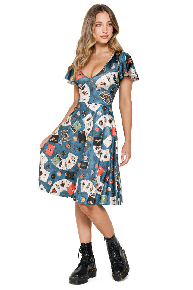 Marilyn style midi dress from Fallout x BlackMilk with all-over retro pattern and fit-and-flare shape.