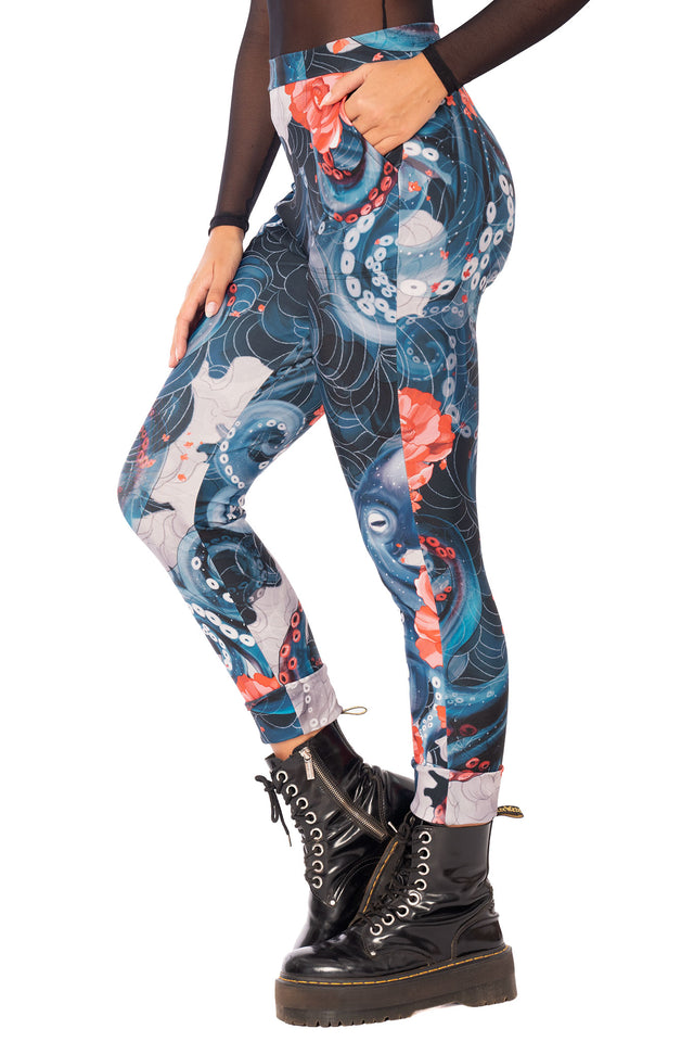 Front full image of Lurking Beneath Cuffed Pants with octopus tentacle print, fitted silhouette and ankle cuffs