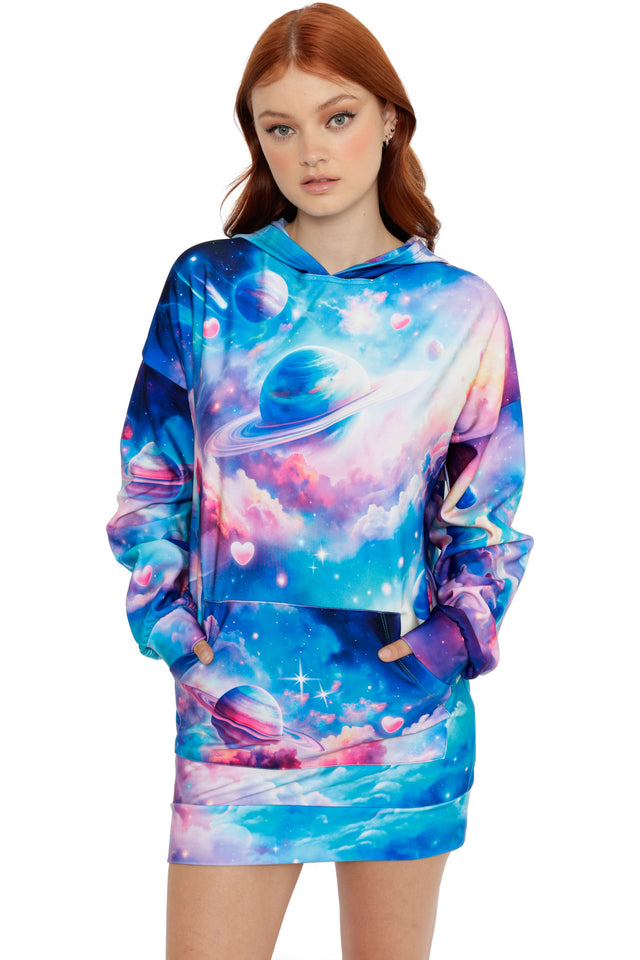 Oversized hoodie dress with pastel galaxy print featuring planets, stars and pink heart details in blue and purple tones