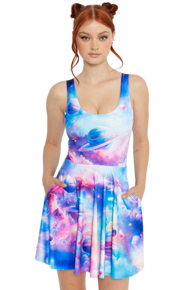 Galaxy skater dress with pastel blue, pink and purple planets, clouds and star details