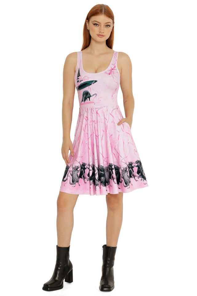 Front view of the Maypole Rats Longline Dress from the Lora Zombie collection, featuring a pink base with illustrated rat motifs and floral details.