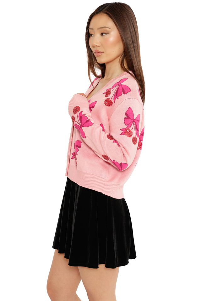 pink christmas jumper cropped knit festive layering piece