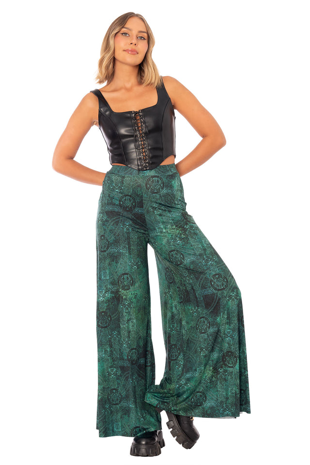 Moss Maiden Palazzo Pants front view showing wide leg printed pants with flowing palazzo silhouette and dark green fantasy inspired artwork