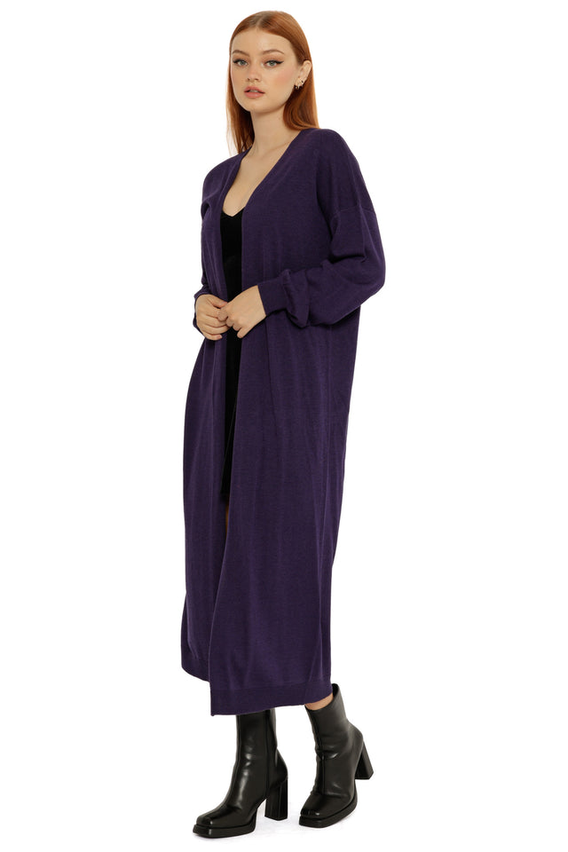 Deep navy Midnight Super Cardigan styled open, featuring a maxi length, soft knit fabric, and slouchy silhouette.