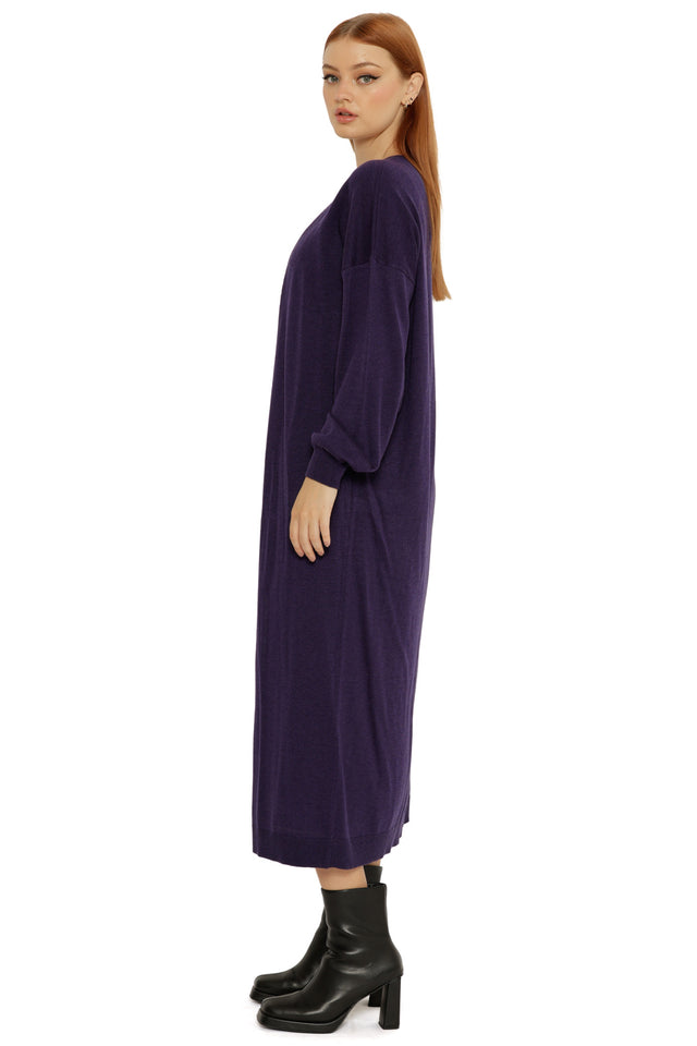 Longline Midnight Super Cardigan in a rich navy tone, worn open to show its oversized fit and cozy drape.