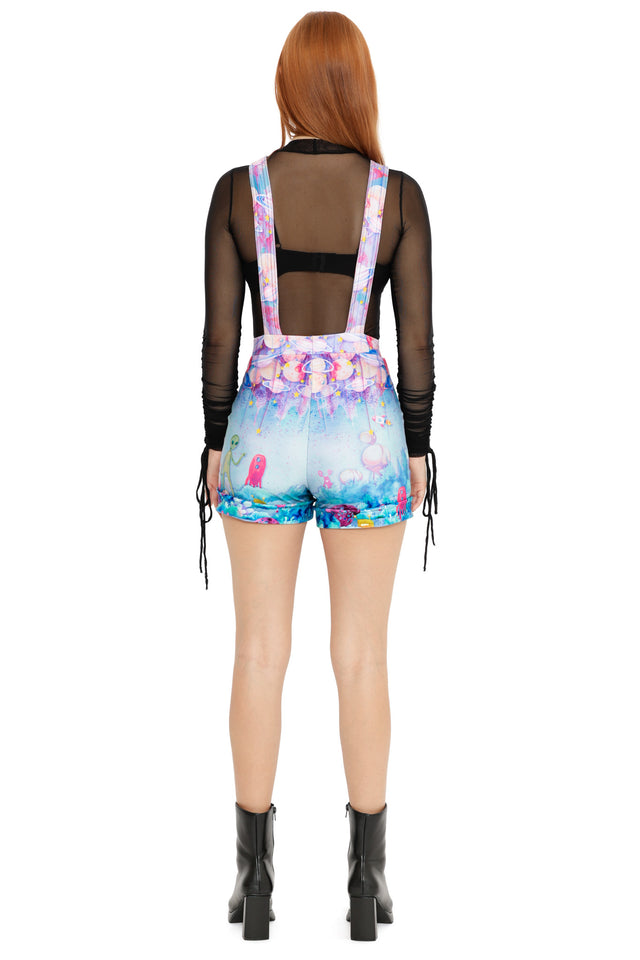 Cosmic print short overalls featuring pastel planets and playful alien illustrations
