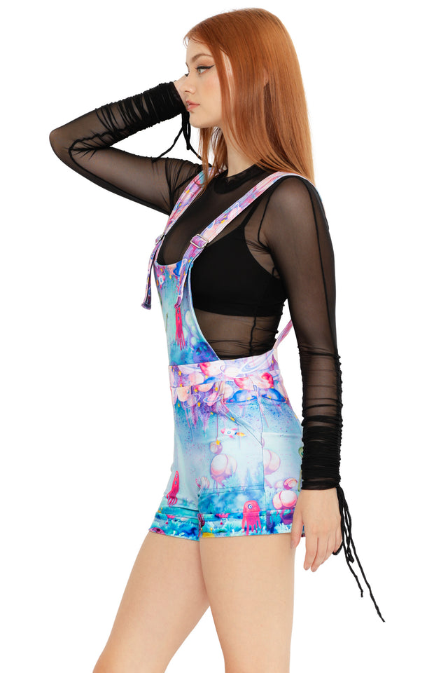 Statement space overalls in pastel tones with alien graphics and sci-fi inspired artwork