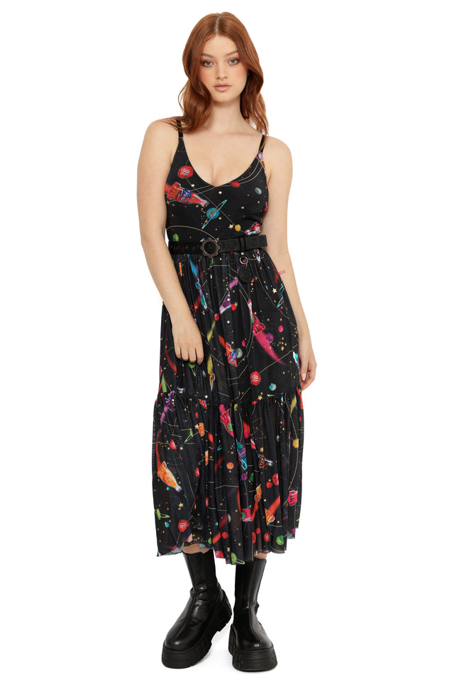 Model wearing Fallout x BlackMilk Nuka-Space Sheer Midaxi featuring Nuka-Cola rocket ships and atomic star print.