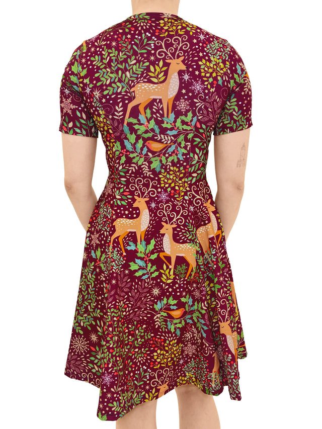 Dress with deer and floral pattern on a white background