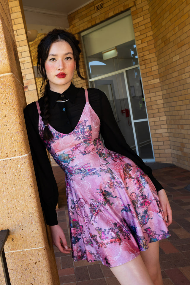 BlackMilk One Hundred Demons Mini Strappy Dress front studio image showing pink strappy mini dress with Japanese demon print and flared skirt
