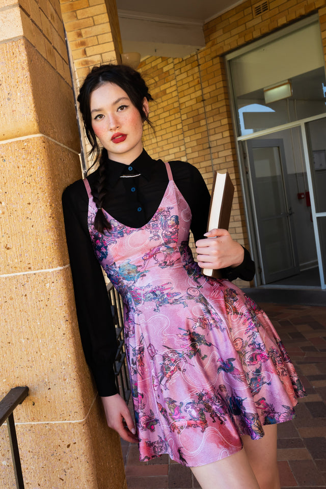 One Hundred Demons Mini Strappy Dress front view showing pink mini dress with fine straps, fitted bodice and Japanese folklore inspired demon print