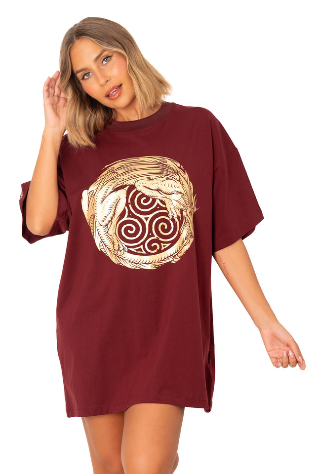Ouroboros Giant Tee front close view showing oversized burgundy t shirt with ouroboros dragon graphic and relaxed fit