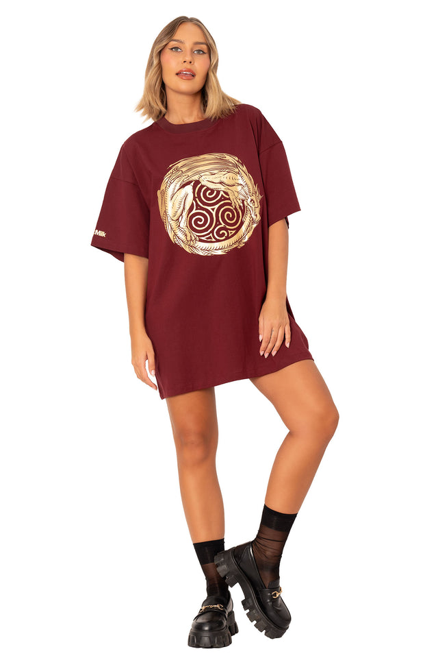 Unisex oversized burgundy giant tee with ouroboros dragon graphic, relaxed drop shoulder fit and mythology inspired statement print