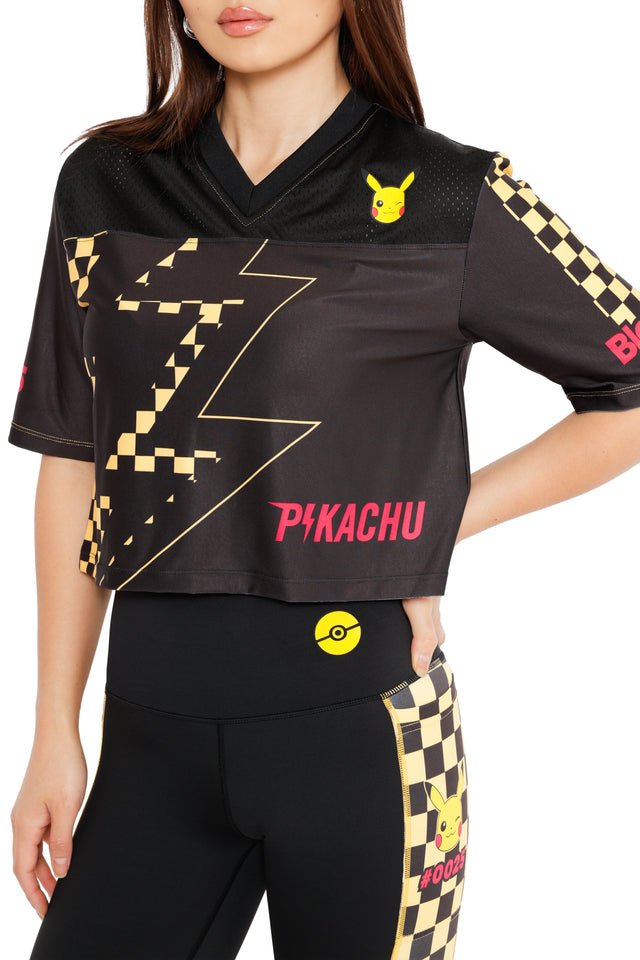 BlackMilk Pikachu Nostalgia Crop Touchdown worn with high waisted leggings, black Pokémon crop top with bold lightning bolt design