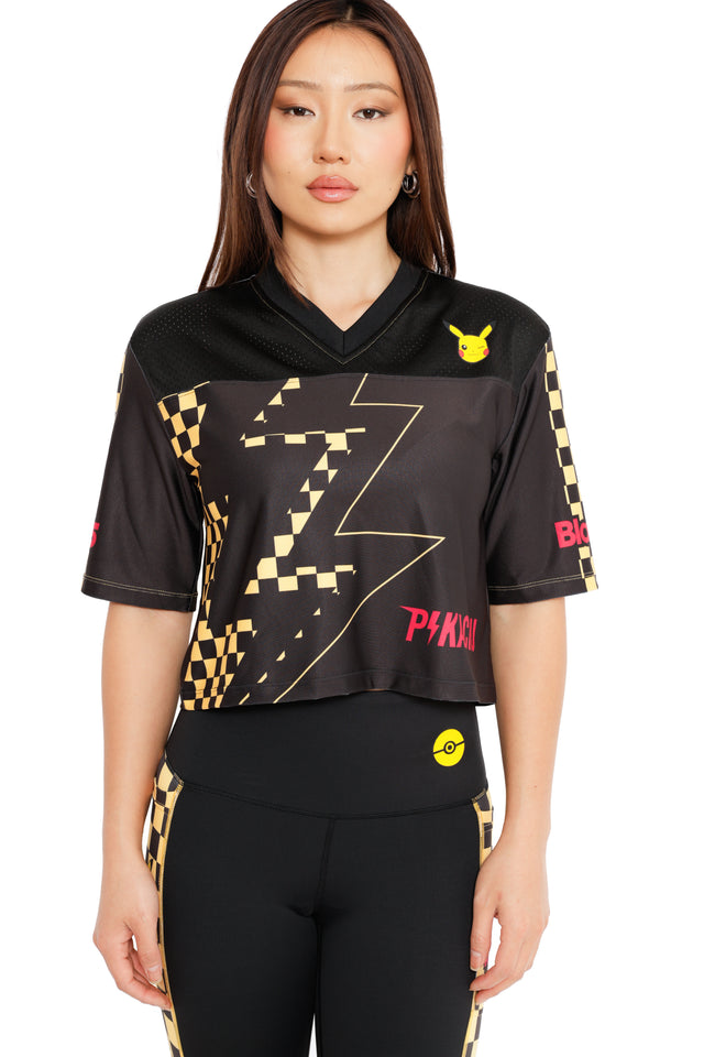 Pikachu Nostalgia Crop Touchdown styled for Pokémon Day, cropped black jersey top with yellow pixel lightning and Pikachu badge