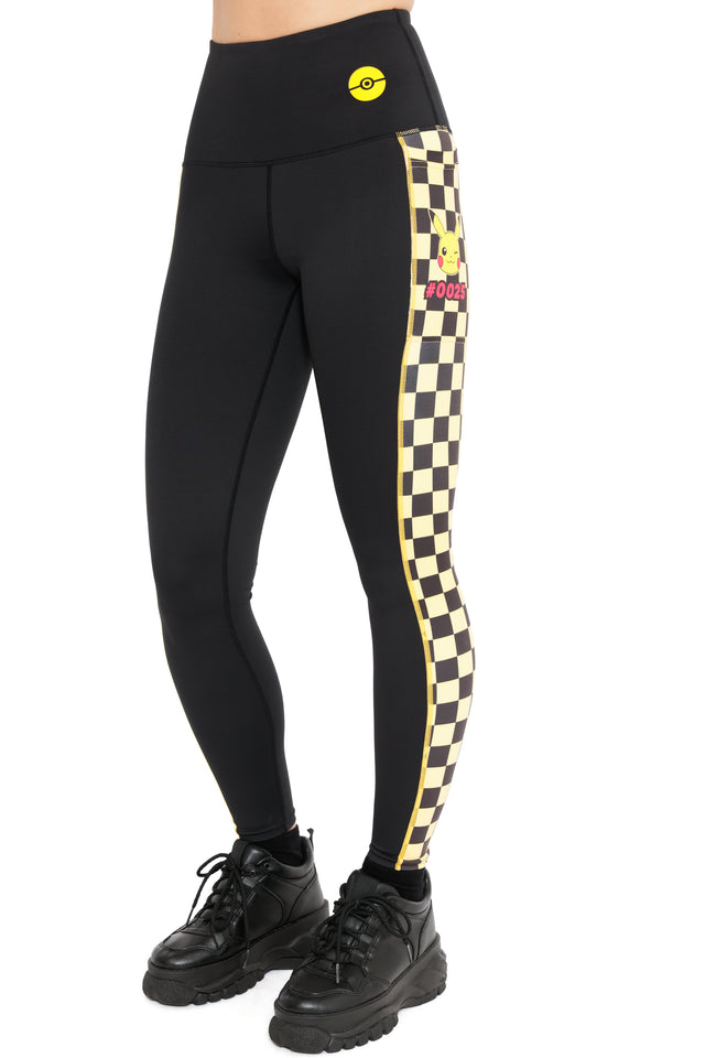 Pokémon Pikachu high waisted ninja pants featuring retro pixel checkerboard print, black stretch fabric and Pikachu detail