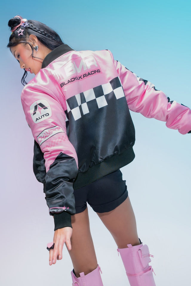 Oversized racing-inspired jacket with holographic patches, bold BMR logo, sporty stripe accents, zip fastening and functional pockets for an alternative streetwear look.