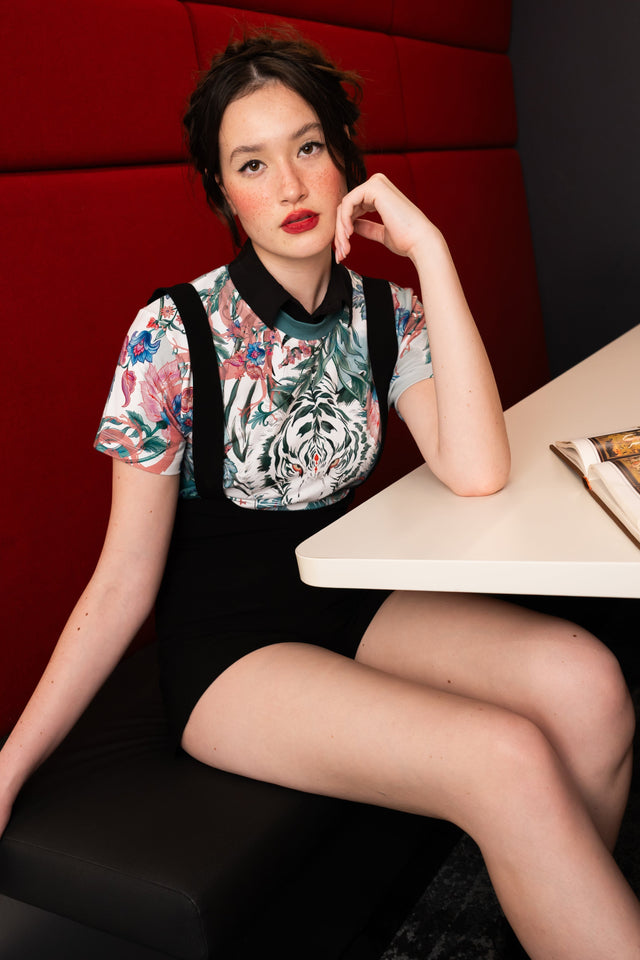 Pretty Fierce Baby Tee front close view showing fitted cropped baby tee with white tiger graphic, floral print and short sleeves