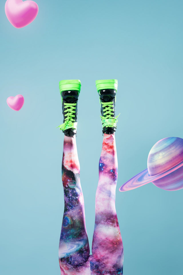 Pink and purple galaxy leggings with dreamy cloud-like nebula patterns