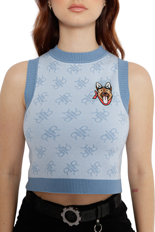 Fallout x BlackMilk blue knit vest featuring Red Rocket pattern and Fallout-inspired embroidered patch detail.