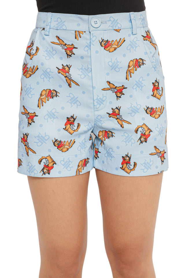 Model wearing Fallout x BlackMilk Red Rocket Station Shorts showcasing Dogmeat character print and high-waisted tailored fit.