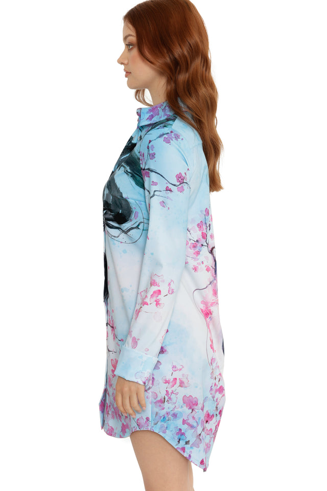 Woman wearing a floral dress with a white background