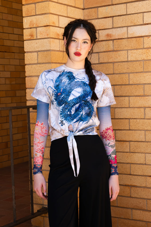 Smoke Show Tie Front Tee front view showing fitted black tie front top with smoky graphic print and short sleeve silhouette