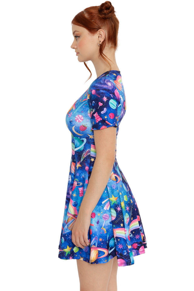 Statement space skater dress in blue tones with colourful planets, rainbows and star motifs