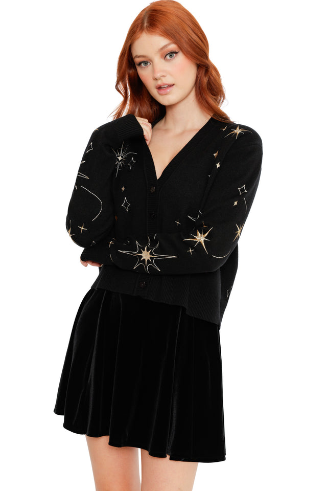 Black V-neck cardigan with gold celestial star embroidery, long sleeves and a soft knit finish