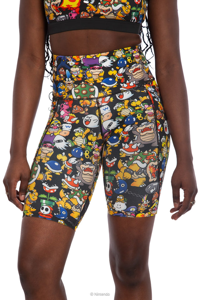 BlackMilk x Super Mario Enemies High Waisted Bike Pants, black bike shorts featuring Bowser, Wario, Waluigi, Goombas, Bullet Bills, Koopa Troopas, Super Mario Merchandise, Collaboration apparel, Officially Licensed