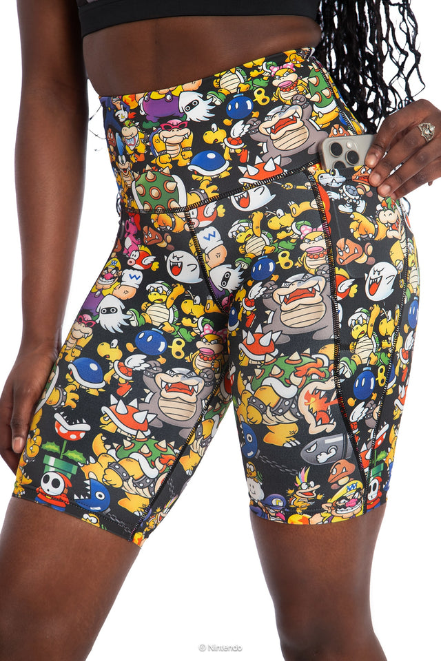 BlackMilk x Super Mario Enemies High Waisted Bike Pants, black bike shorts featuring Bowser, Wario, Waluigi, Goombas, Bullet Bills, Koopa Troopas, Super Mario Merchandise, Collaboration apparel, Officially Licensed