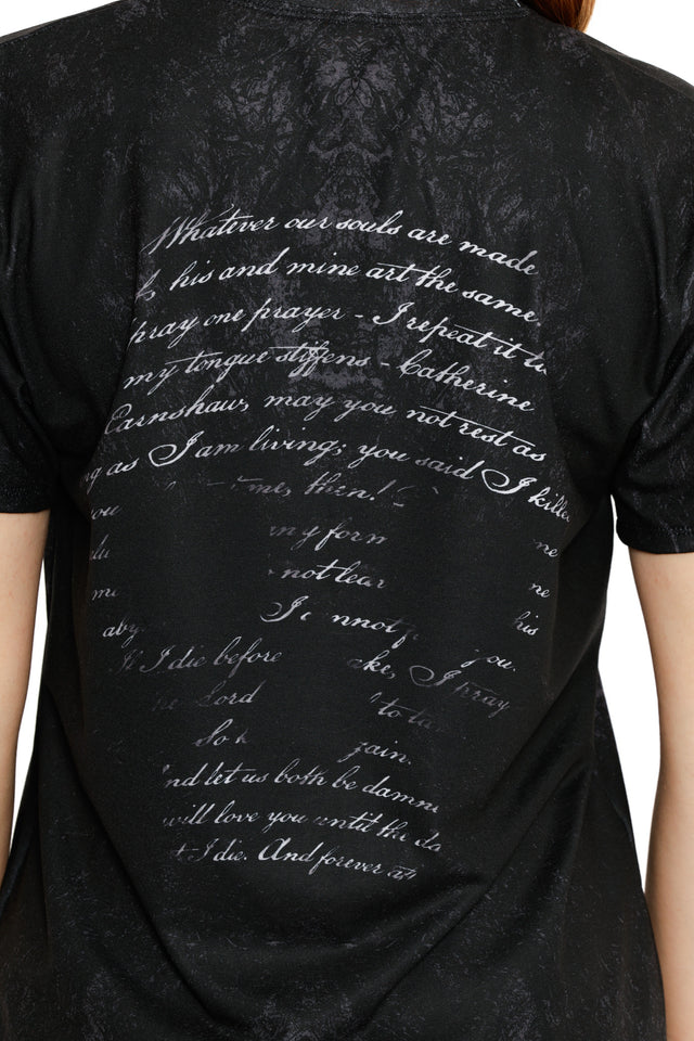 Back detail of the Take Any Form Short Sleeve Boyfriend Tee, showcasing gothic script text inspired by Wuthering Heights printed across a black washed fabric
