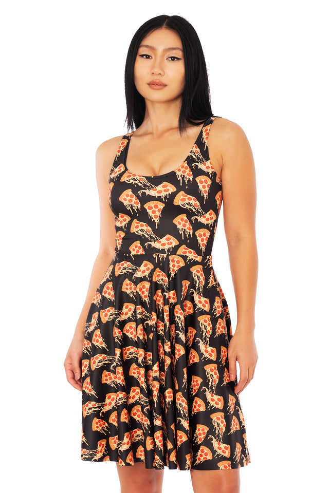 BlackMilk novelty pizza dress worn by model, showing stretchy fabric, fitted bodice and soft drape through the longline skirt
