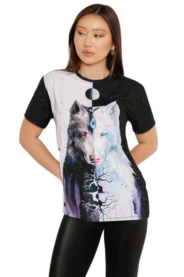 Woman wearing a t-shirt with a wolf design on a white background