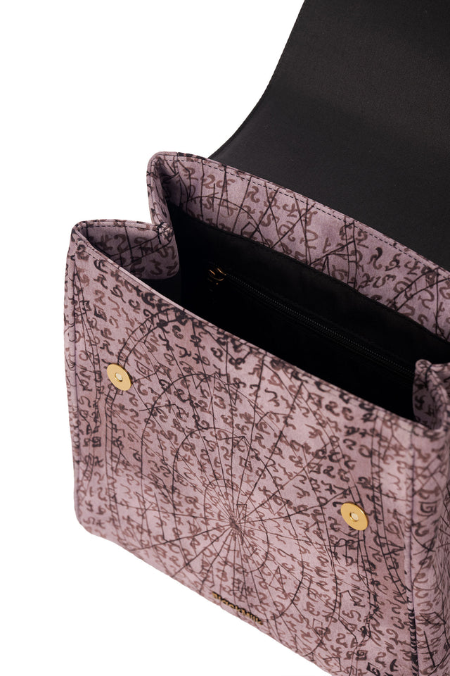 The Elder Scrolls fashion piece featuring satchel backpack with top loop handle, adjustable straps, button closure and mystical rune pattern