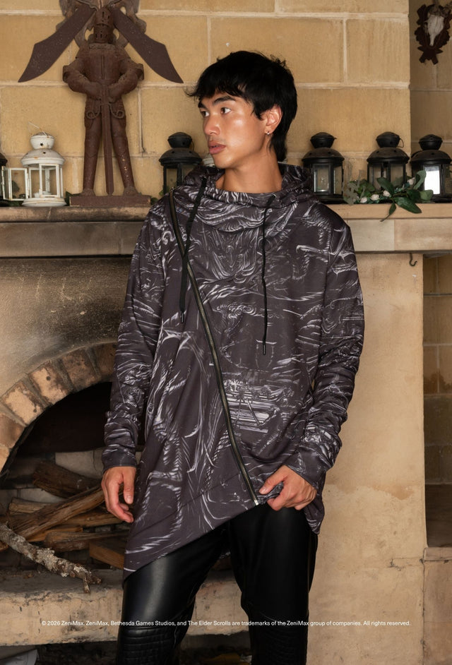 The Elder Scrolls Alduin’s Wall oversized hoodie with hood, drawstring cords, diagonal zip closure and asymmetrical hem inspired by Skyrim