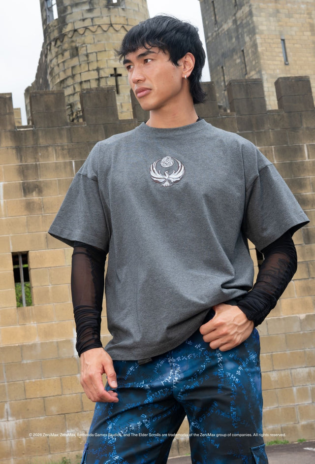 The Elder Scrolls Online clothing inspired cargo pants with Dragonborn rune artwork and utility pockets