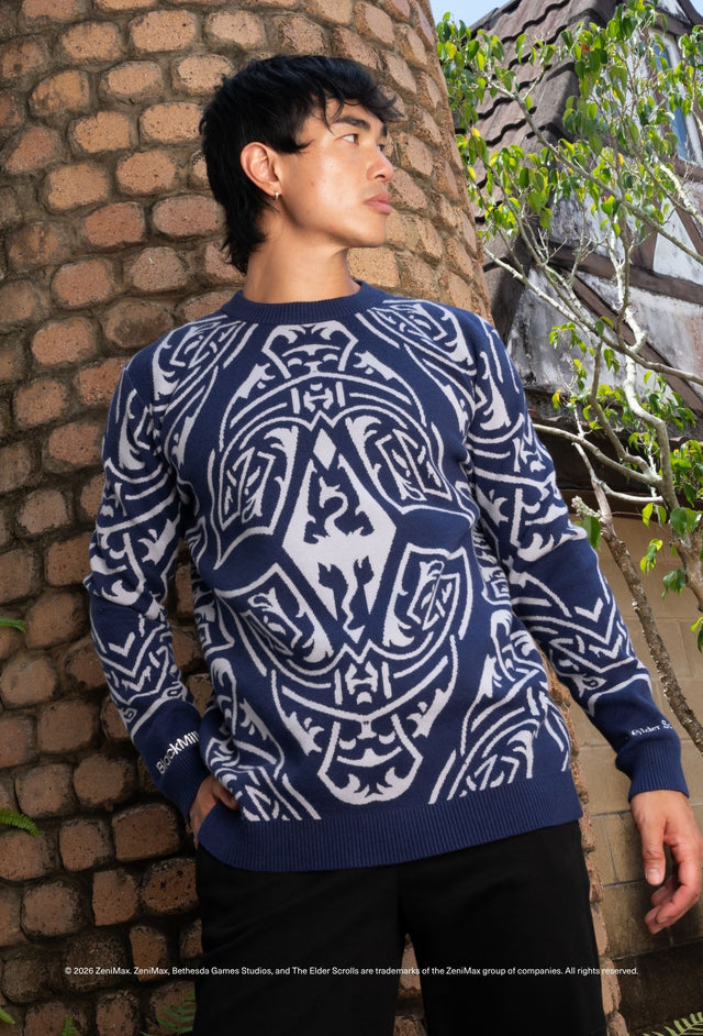The Elder Scrolls clothing piece with oversized sweater fit, soft knit fabric and Skyrim Imperial pattern design