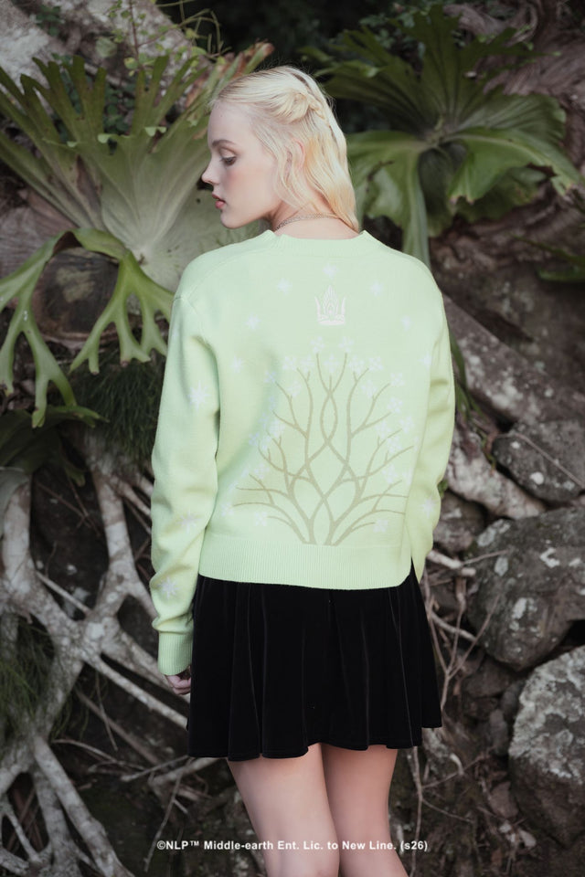 Close-up campaign shot of the Fit For A Queen Knit Cardigan by BlackMilk, showing the celestial star embroidery on soft sage green knit fabric.