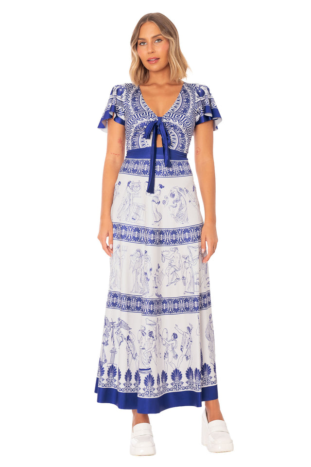 Woman of Leisure Rio Maxi Dress featuring full length silhouette, tie front neckline and ceramic inspired Grecian print